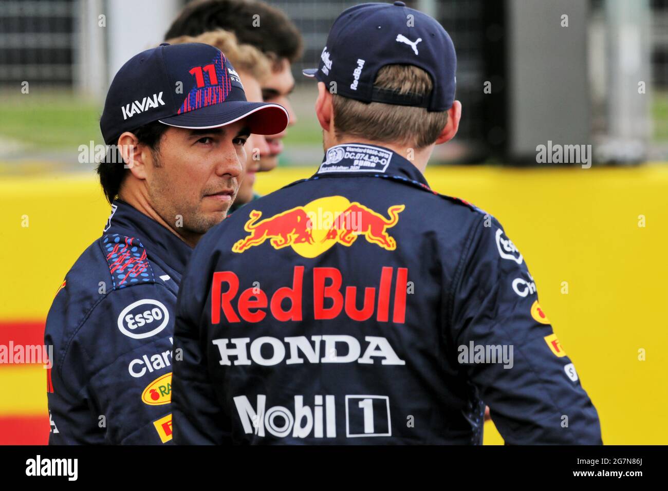 Silverstone, UK. 15th July 2021. (L to R): Sergio Perez (MEX) Red Bull  Racing and team mate Max Verstappen (NLD) Red Bull Racing - 2022 Car  Launch. 15.07.2021. Formula 1 World Championship,