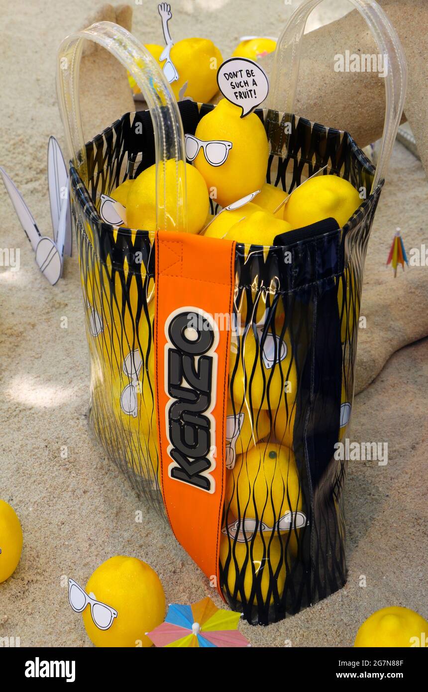 Perspex Enclosed Beach Scene Display With Lemons In A Kenzo Shopping Bag In Las Rozas Open Air Outlet Shopping Mall Madrid Spain Summer 2021 Stock Photo Alamy