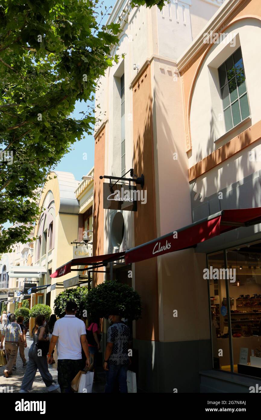 C. & J. Clark International Ltd known as Clarks shoe retailer shop sign and  shop entrance Las Rozas shopping mall Madrid Spain Stock Photo - Alamy