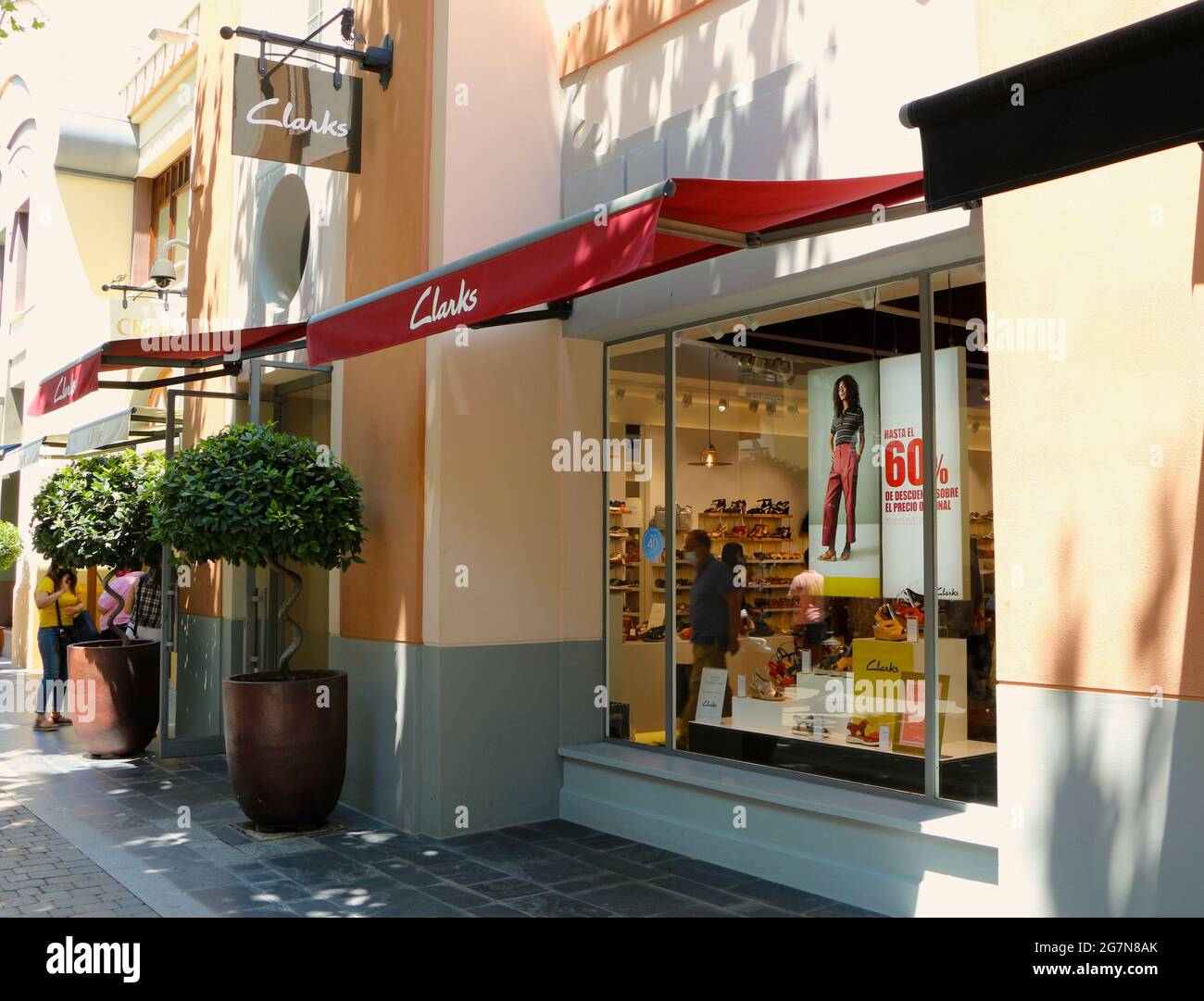 C. & J. Clark International Ltd known as Clarks shoe retailer shop sign and  shop entrance Las Rozas shopping mall Madrid Spain Stock Photo - Alamy