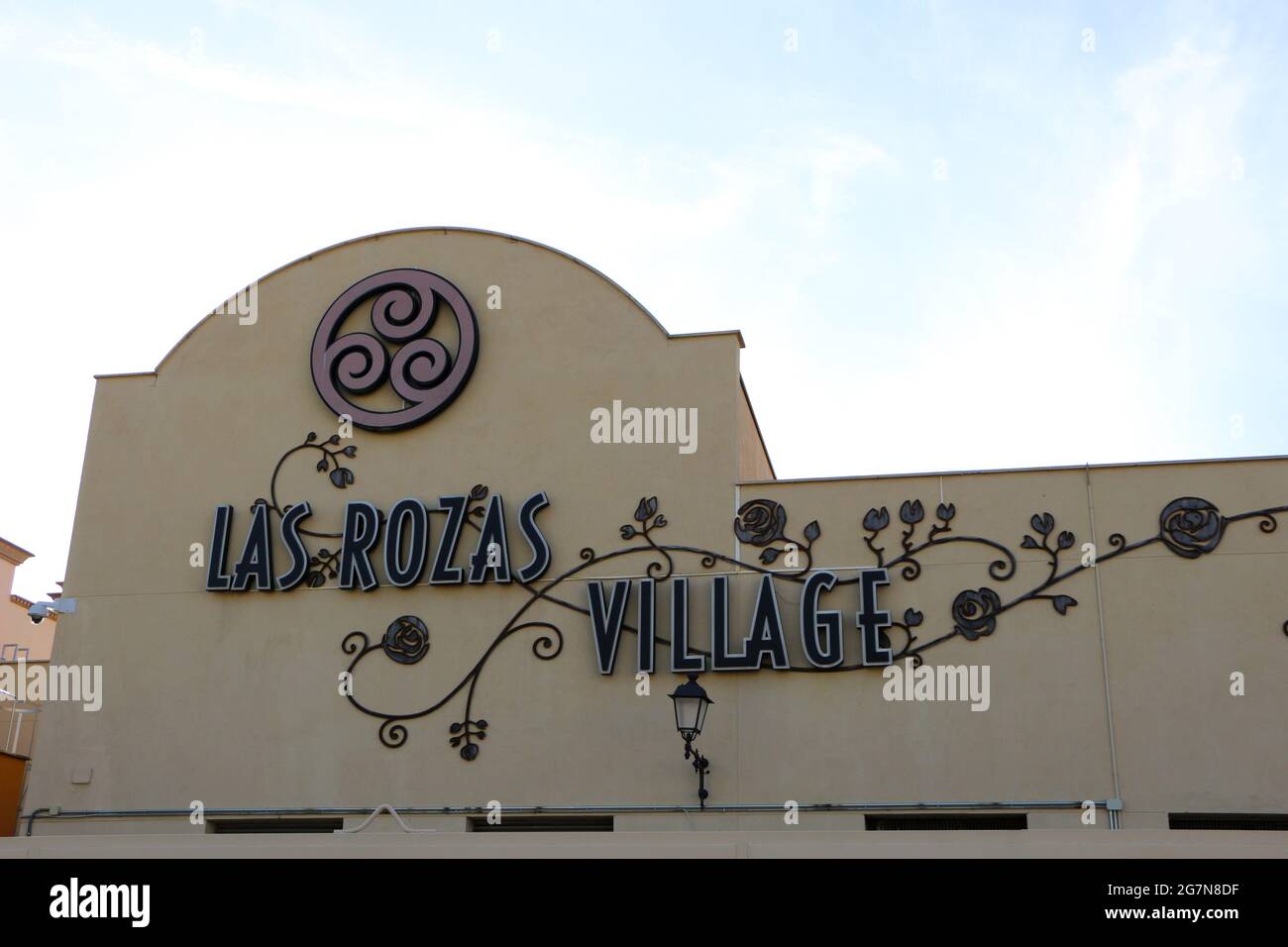 Large wall sign at the entrance to Las Rozas Village open air outlet  shopping mall Madrid Spain Stock Photo - Alamy
