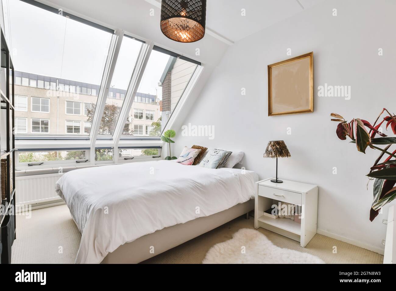 Interior of a cozy and bright bedroom with beautiful decoration Stock ...