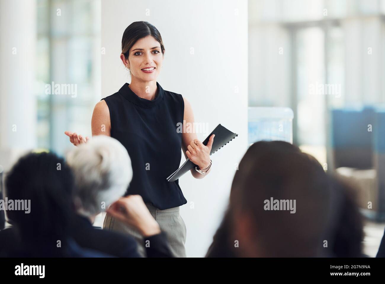 People attend conferences to get inspired by talks and speeches Stock Photo