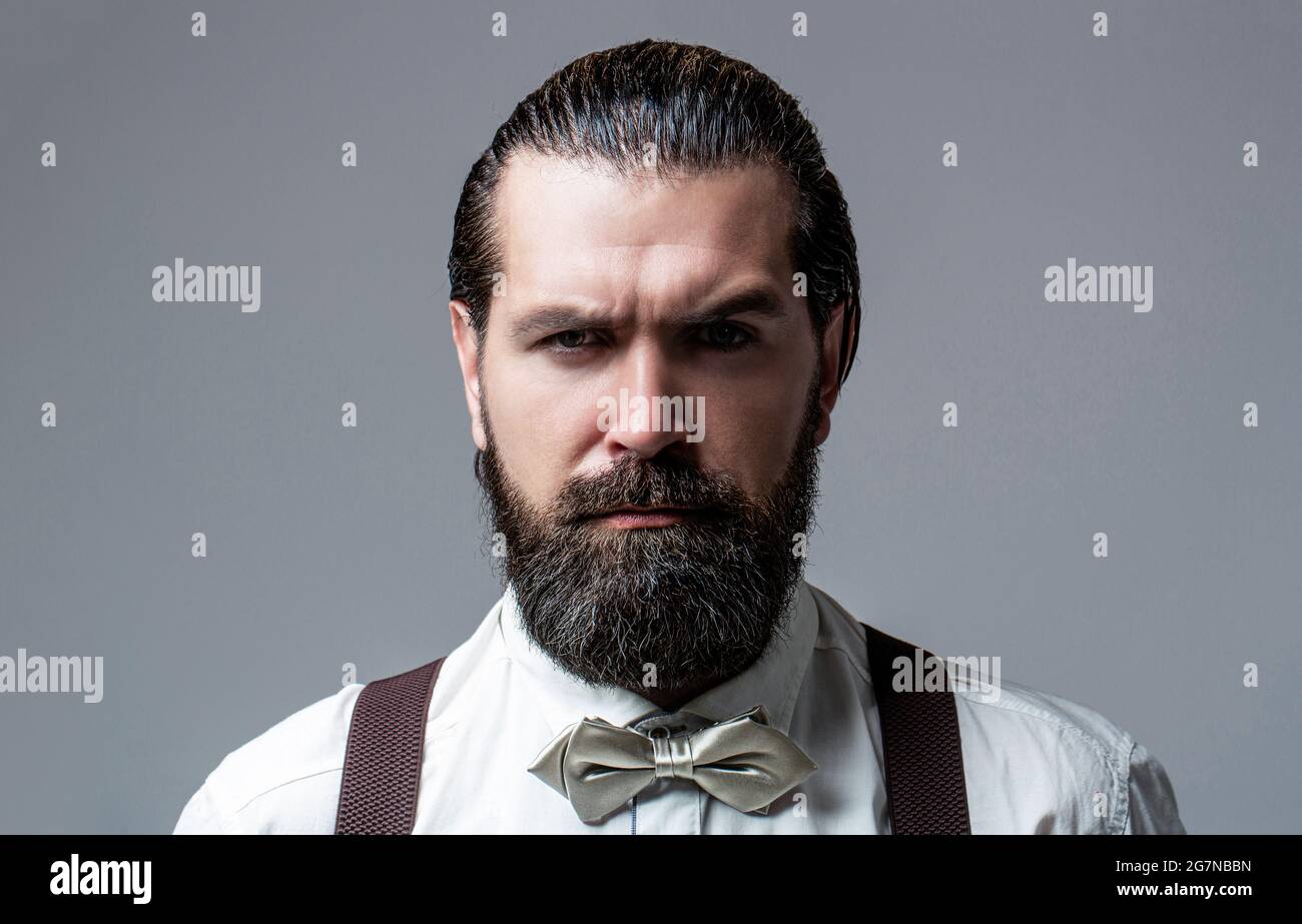 Handsome man wearing suspenders hi-res stock photography and images - Alamy