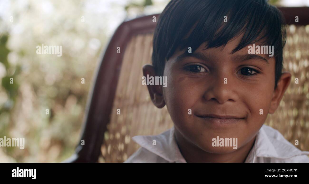 Portrait of a pretty smiling Indian boy Stock Photo - Alamy