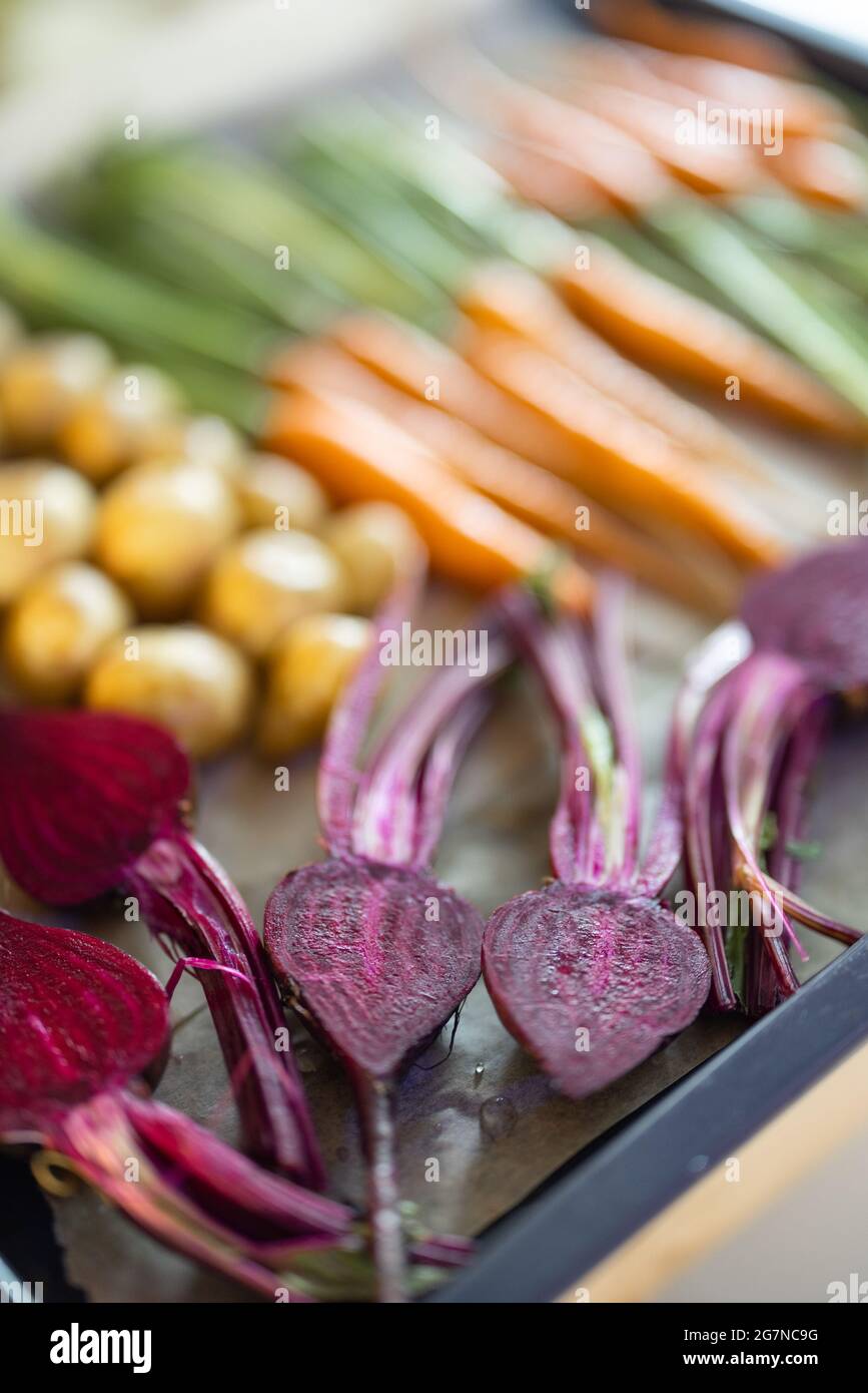 Fresh baked root vegetables Stock Photo