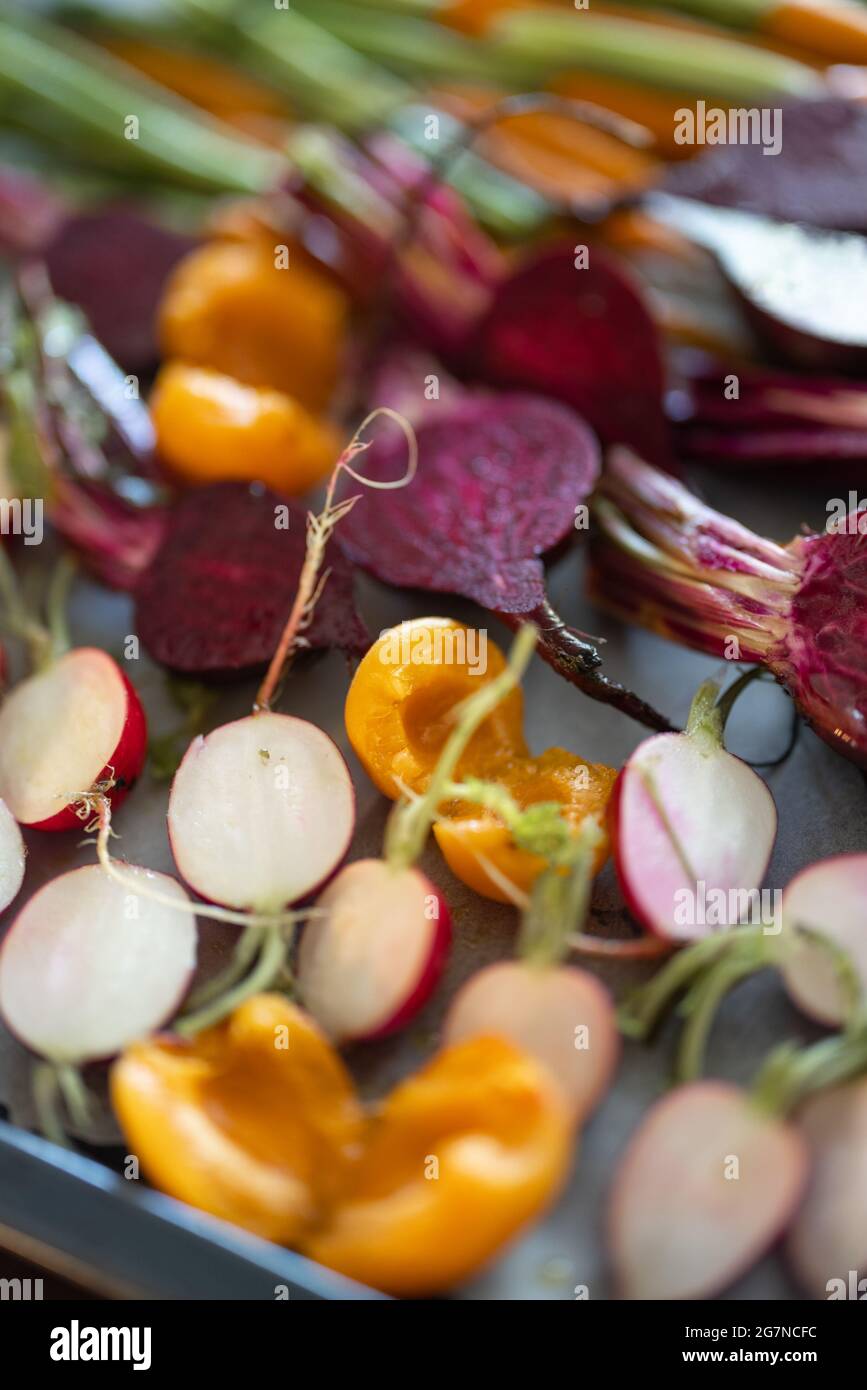 Fresh baked root vegetables Stock Photo