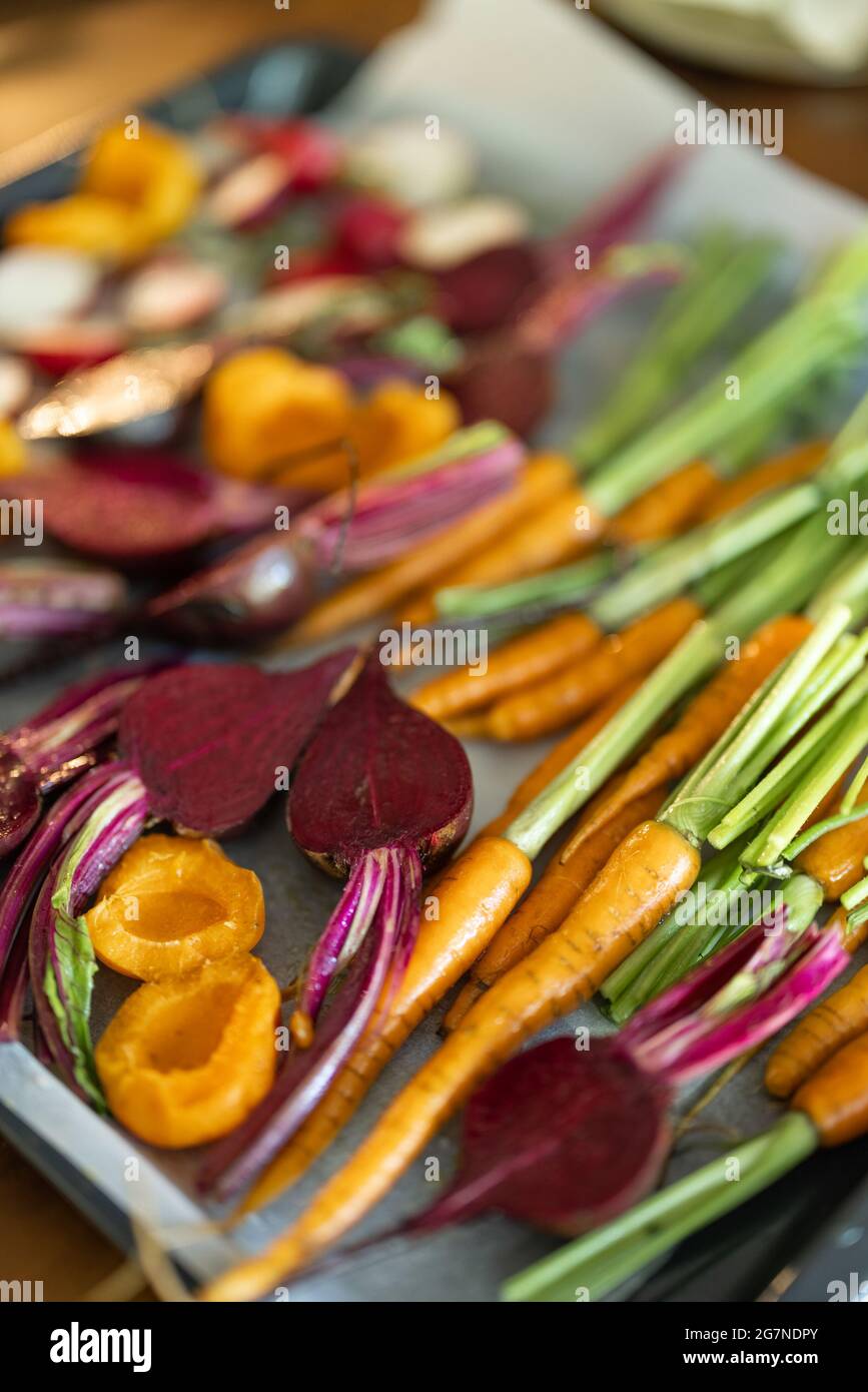 Fresh baked root vegetables Stock Photo
