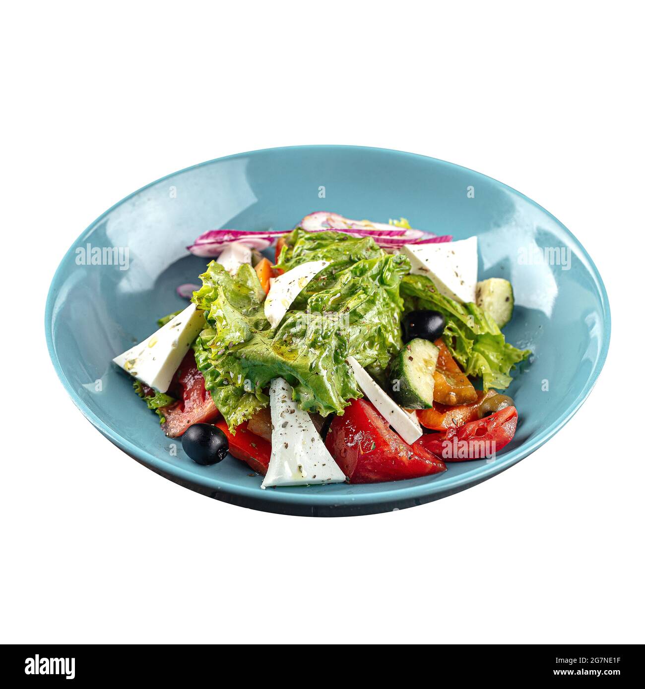 Isolated plate of greek salad with fresh vegetables Stock Photo