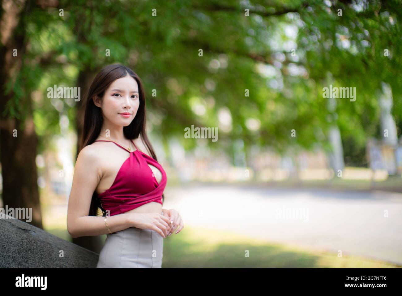 Woman in red skirt hi-res stock photography and images - Alamy