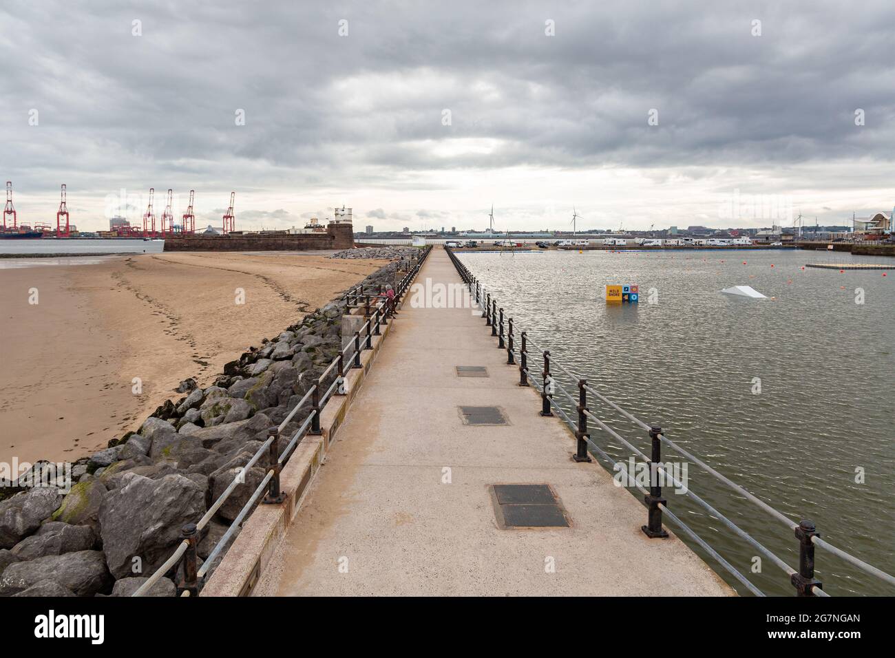 Marine Lake Promenade on the seafront, New Brighton, Wirral, UK. Fort Perch Rock in the background. Stock Photo