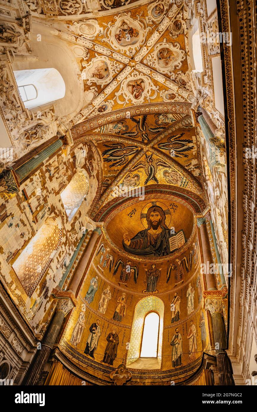 Cefalu,Sicily-June 6, 2021.Roman Catholic cathedral decorated in Byzantine mosaic.Decorative art of Christ Pantokrator.Famous UNESCO Heritage site Stock Photo