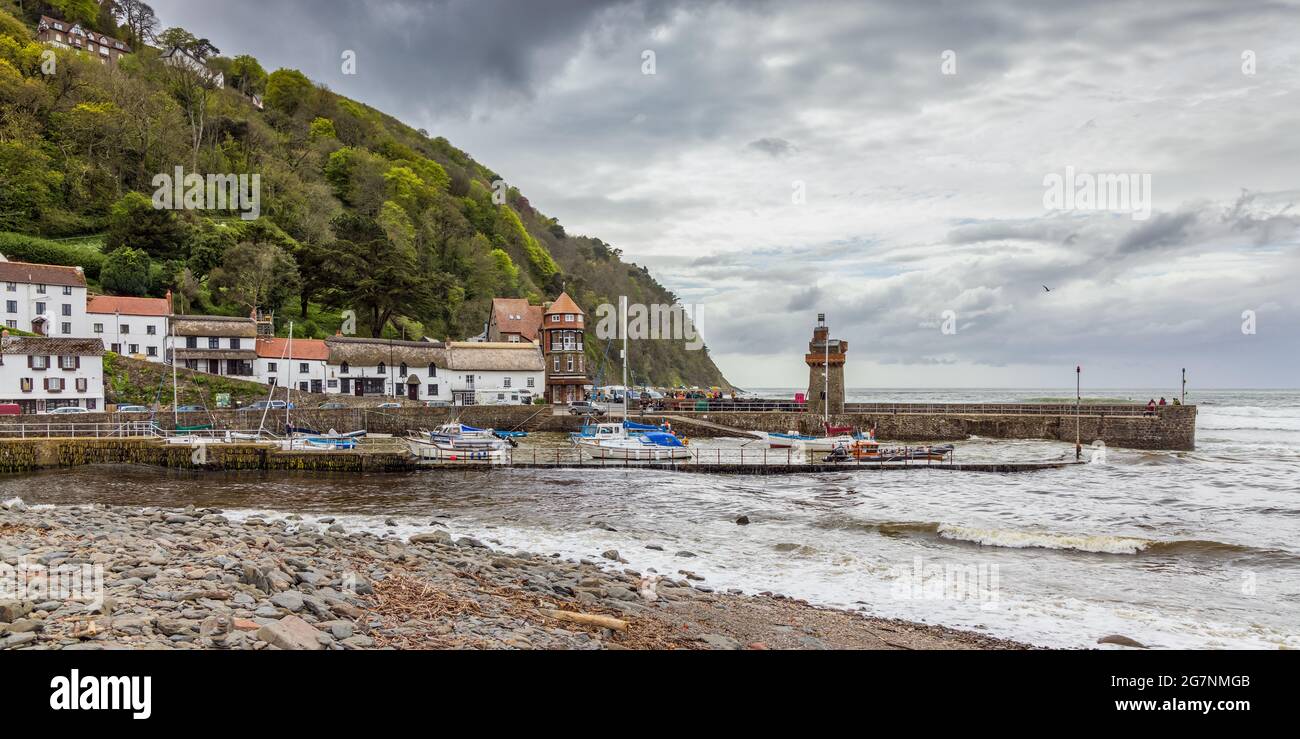 Lynmouth harbour at high tide with the Rhenish Tower on the harbour wall, North Devon, England. Stock Photo