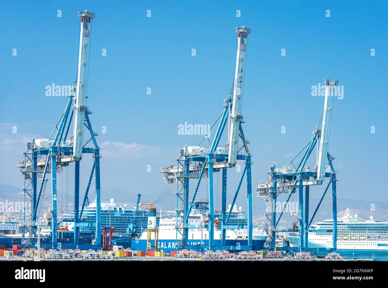 Three portal cranes in cargo port of Limassol, Cyprus Stock Photo