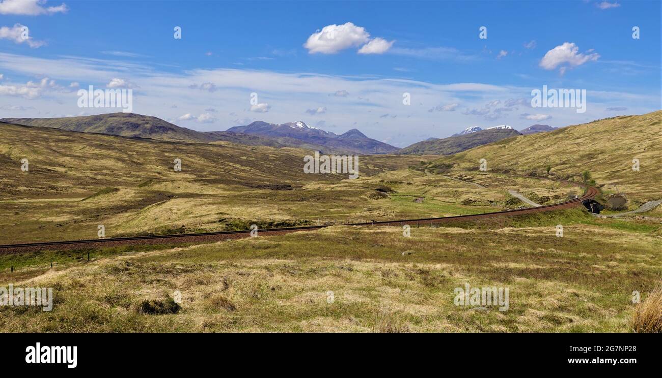 West Highland Railway Scottish Highlands near Corrour Station, Stob Ban and Grey Corries in distance. Stock Photo