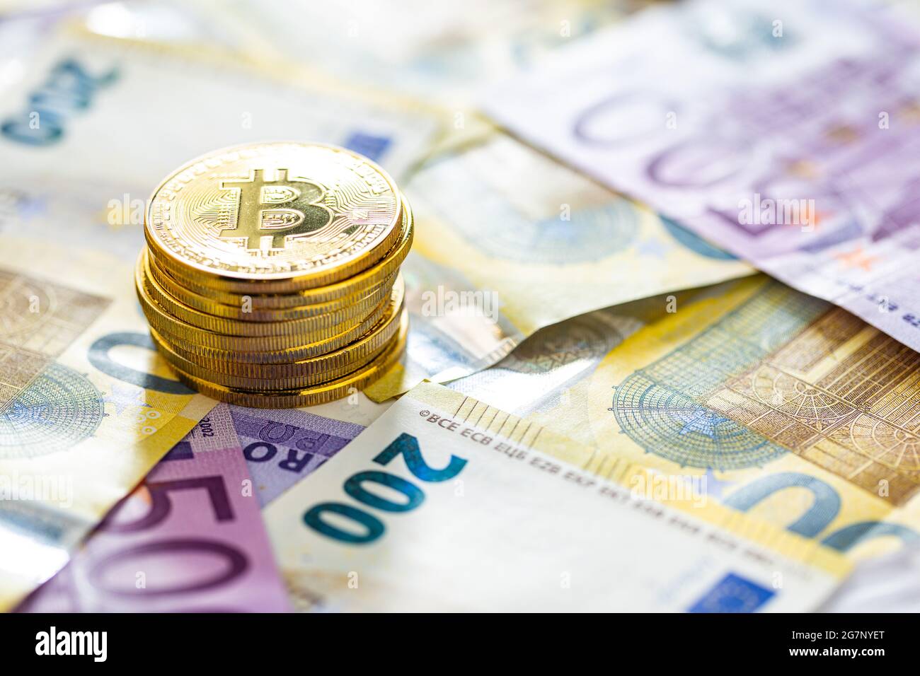Bitcoins and euros, money and currency exchange rate concept Stock Photo -  Alamy