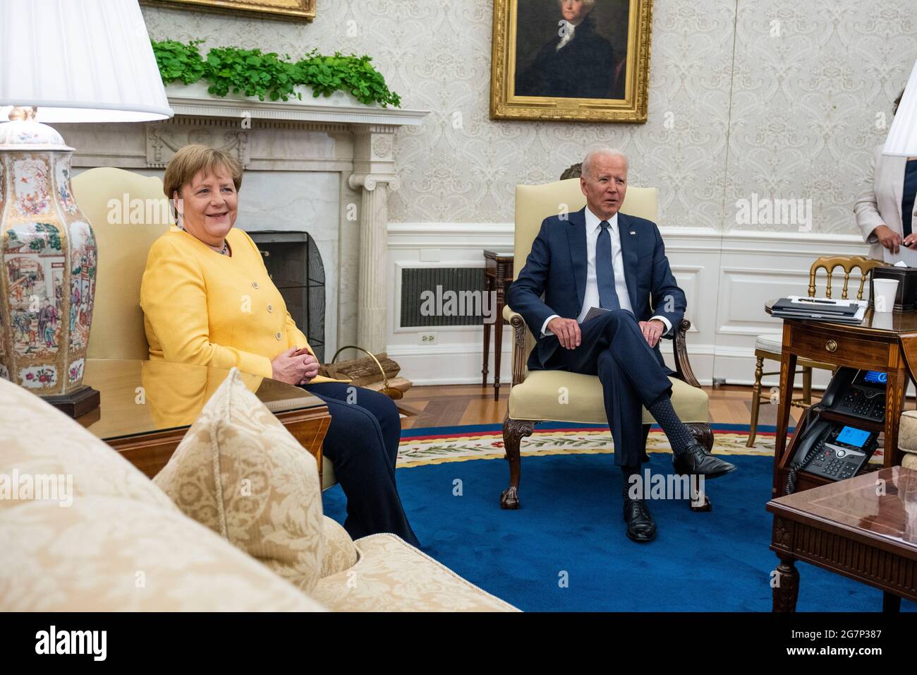 United States President Joe Biden, left, meets Chancellor Dr. Angela Merkel of Germany on the Oval Office of the White House in Washington, DC on Thursday, July 15, 2021. Credit: Doug Mills/Pool via CNP /MediaPunch Stock Photo