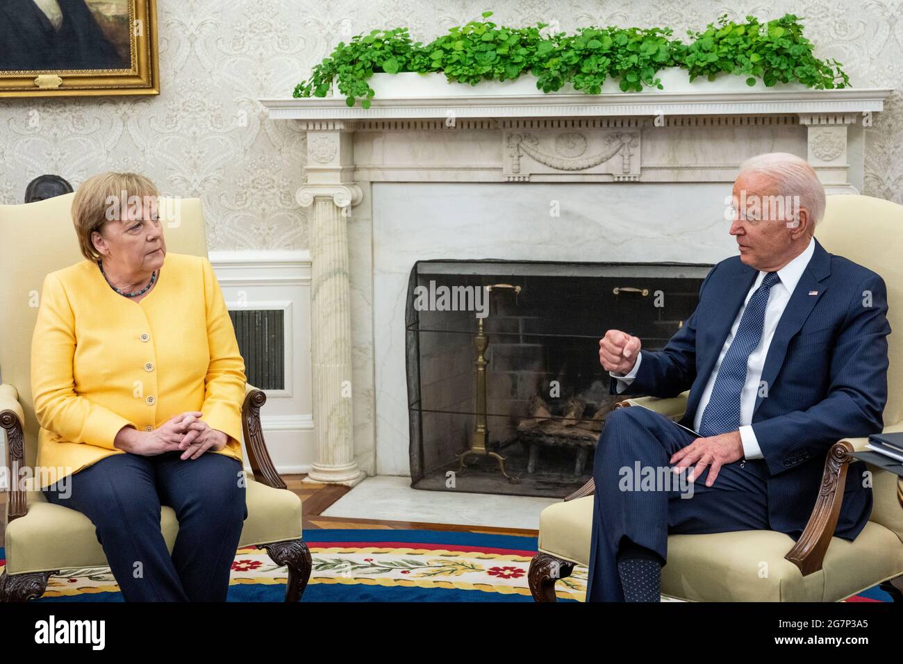 United States President Joe Biden, left, meets Chancellor Dr. Angela Merkel of Germany on the Oval Office of the White House in Washington, DC on Thursday, July 15, 2021. Credit: Doug Mills/Pool via CNP /MediaPunch Stock Photo