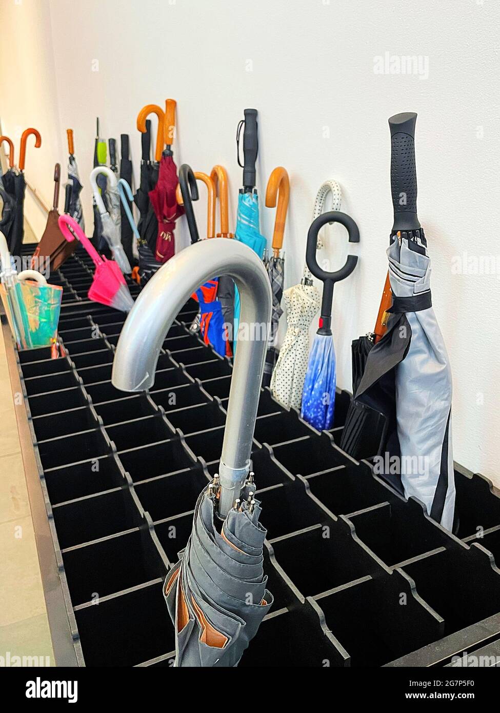 Umbrellas in an Unattended Rack in a New York City Museum Lobby, NYC