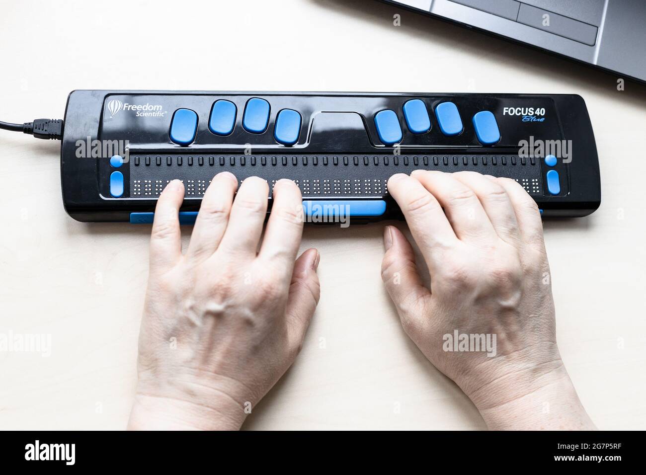 Moscow, Russia - June 5, 2021: female hands touch of Focus 40 Blue Braille  Display. Freedom Scientific is the largest manufacturer of assistive techno  Stock Photo - Alamy