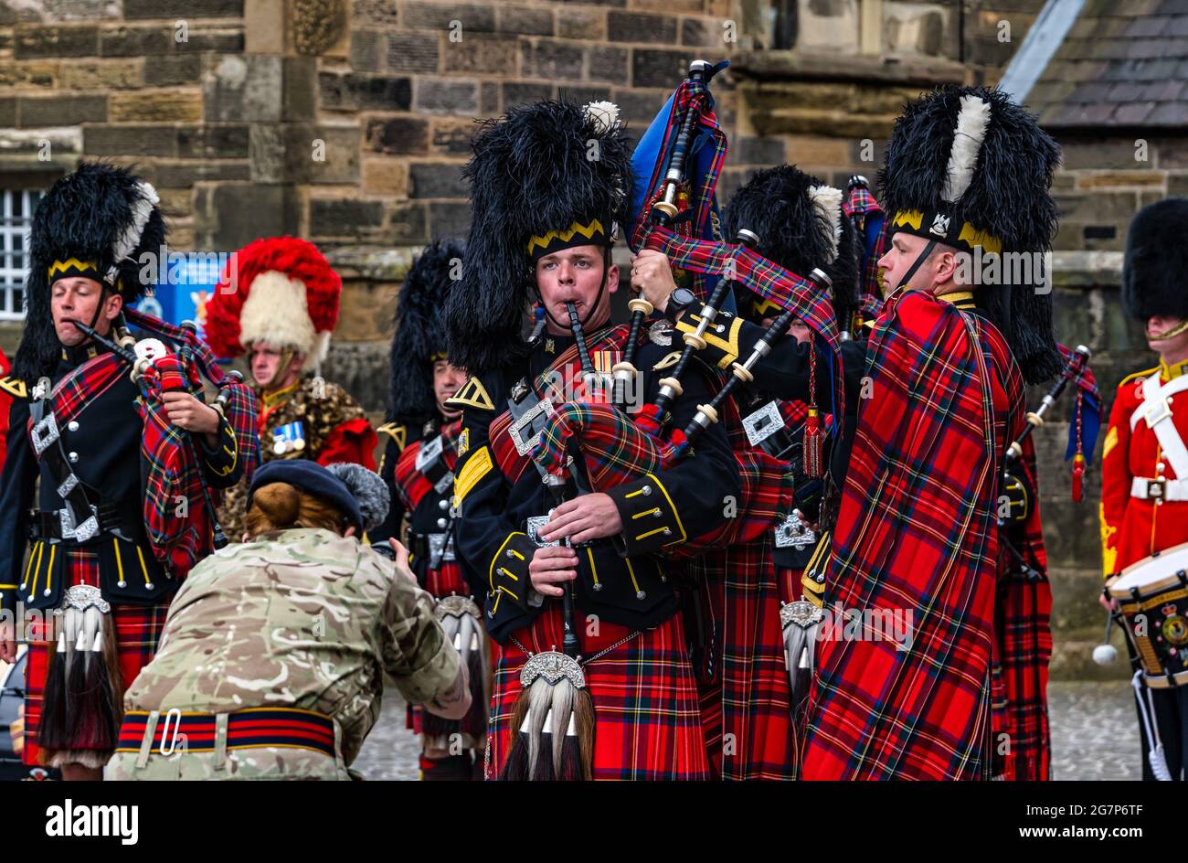 Royal Scots Dragoon Guards military bagpipe band wearing kilts tuning bagpipes at Edinburgh Castle in preparation for a ceremony, Scotland, UK Stock Photo