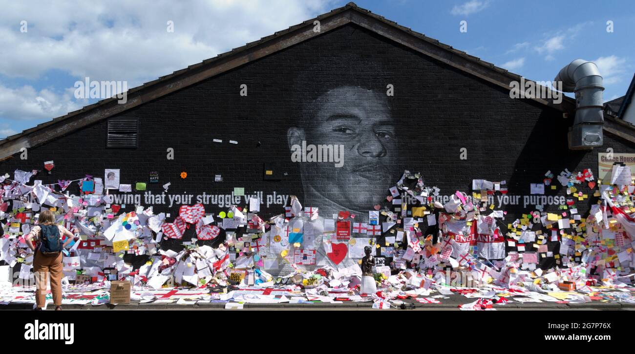 Close up of a small part of the giant Manchester United player Marcus  Rashford mural in Withington, Manchester, England, United Kingdom, that was  vandalised with abusive graffiti after England's Euro2020 football loss