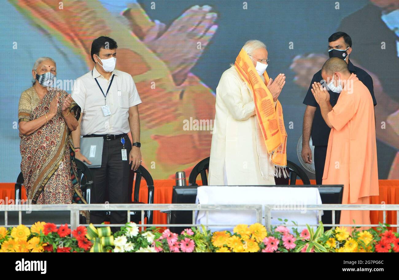 Varanasi, India. 15th July, 2021. VARANASI, INDIA - JULY 15: Prime Minister Narendra Modi with Chief Minister Yogi Adityanath and others during the inauguration and foundation stone laying of many projects worth Rs 1500 Crore schemes at IIT BHU ground on July 15, 2021 in Varanasi, India. He also inaugurated the International Cooperation and Convention Centre, 'Rudrakash', which has been constructed with Japanese assistance later in the day. (Photo by Mohd. Muqeed/Hindustan Times/Sipa USA) Credit: Sipa USA/Alamy Live News Stock Photo