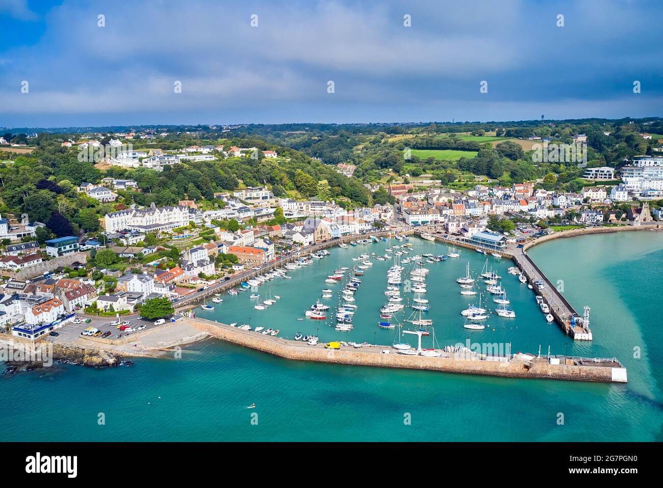 Aerial drone image of St Aubin's Harbour and Village at high tide in ...