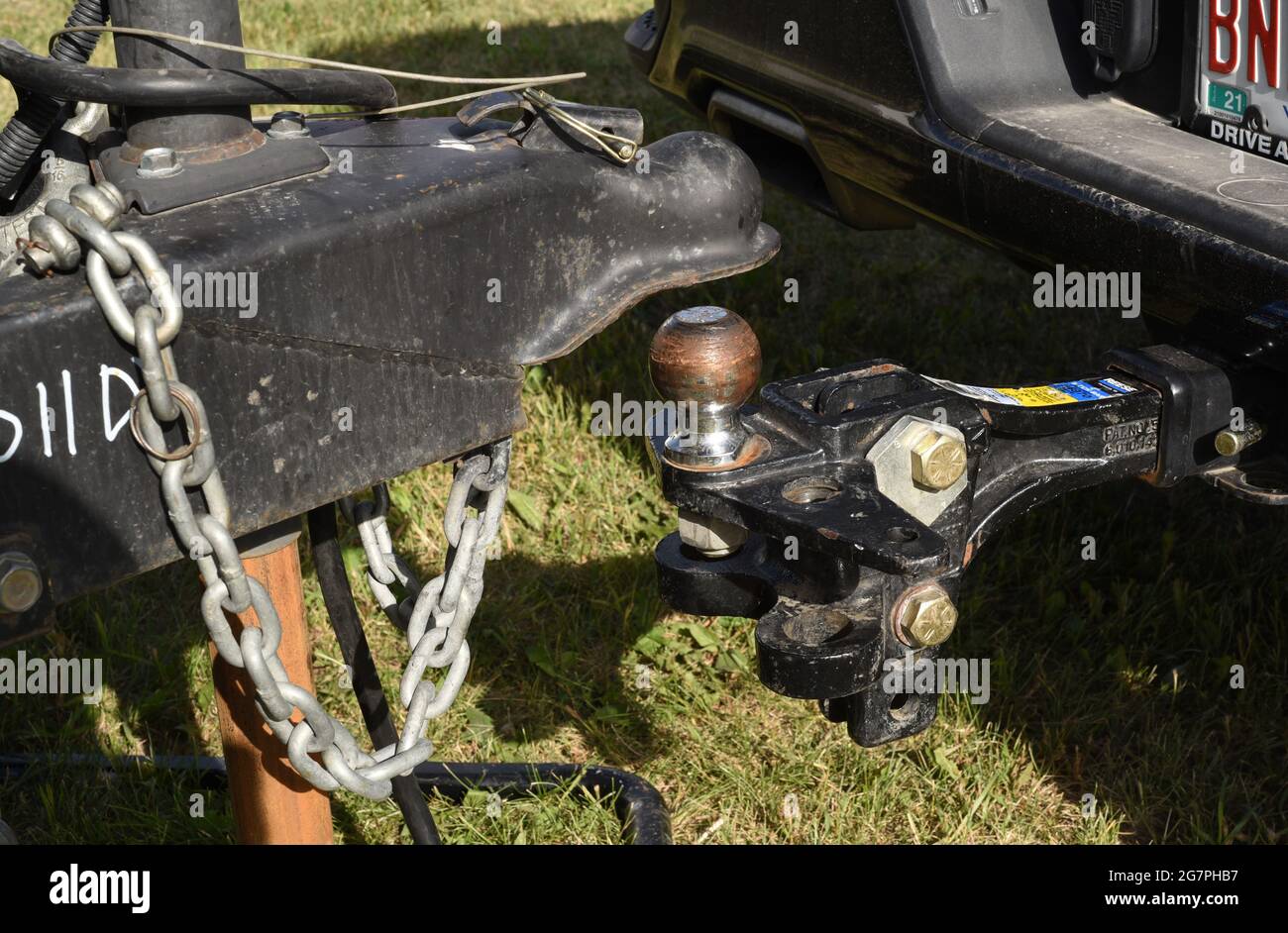 A ball hitch for attaching a travel trailer to a truck for towing Stock