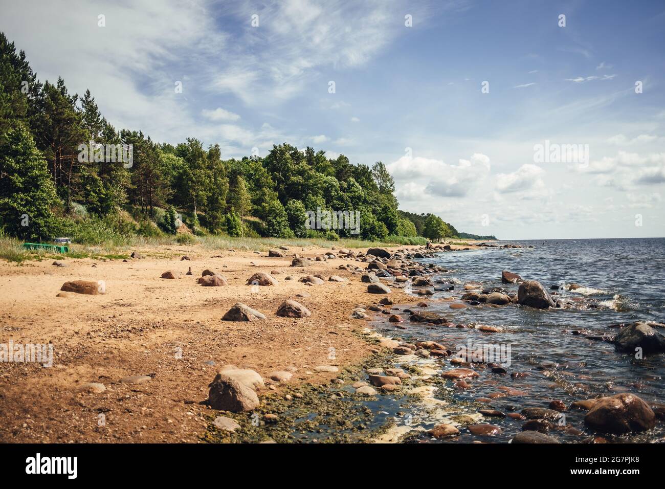Beautiful scenery of the beach with splashing sea waves Stock Photo - Alamy