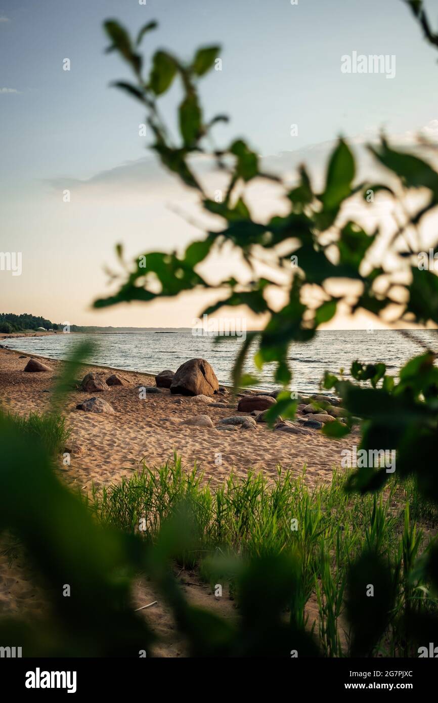 Beautiful scenery of a sea at sunset Stock Photo - Alamy