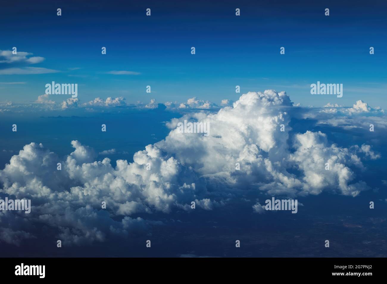 big cloud over big city under blue sky, photo may has some noise Stock Photo