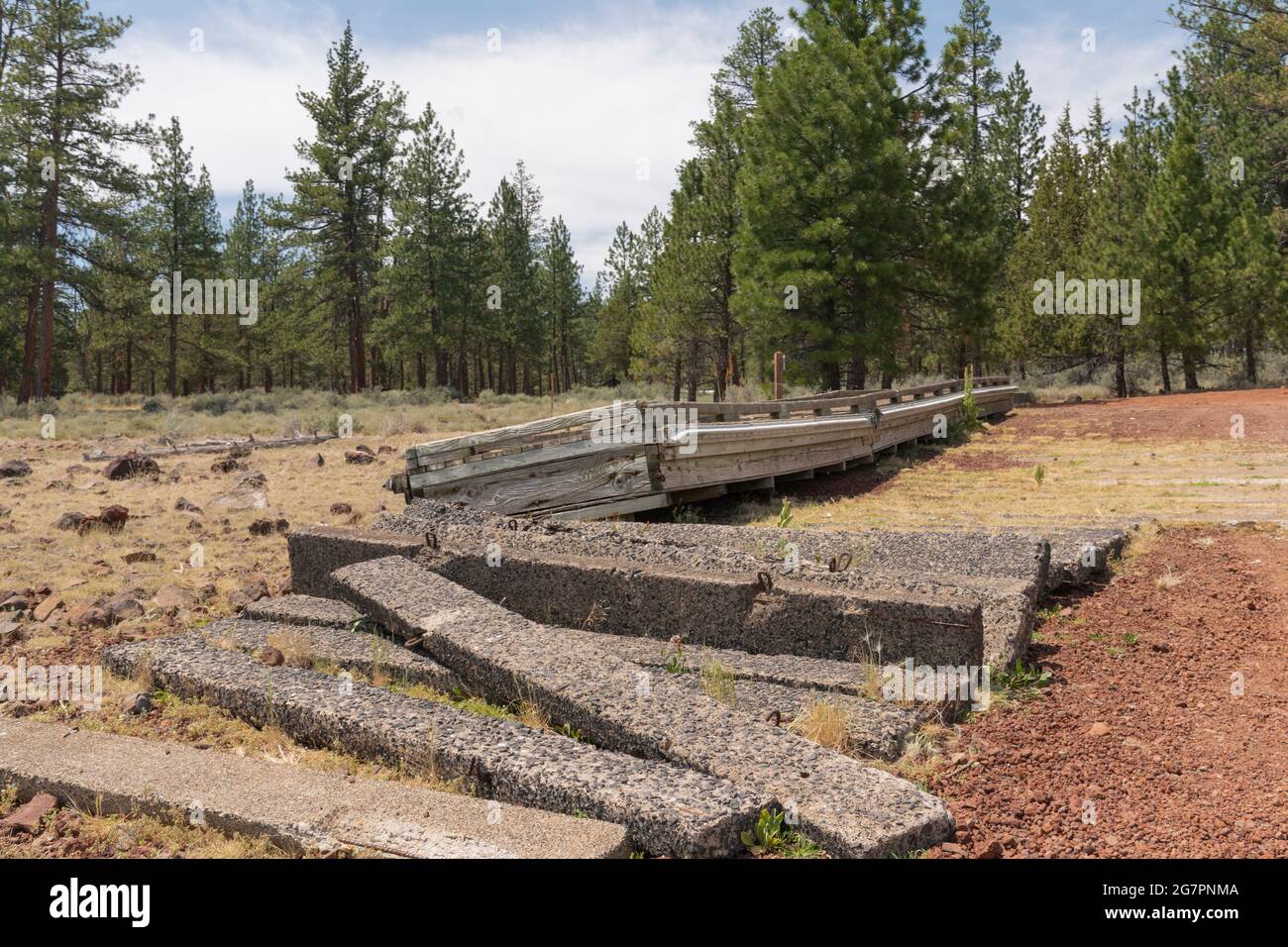 A boat ramp and dock remain high and dry during extreme drought at Thompson Reservoir in Lake County, Oregon. Stock Photo