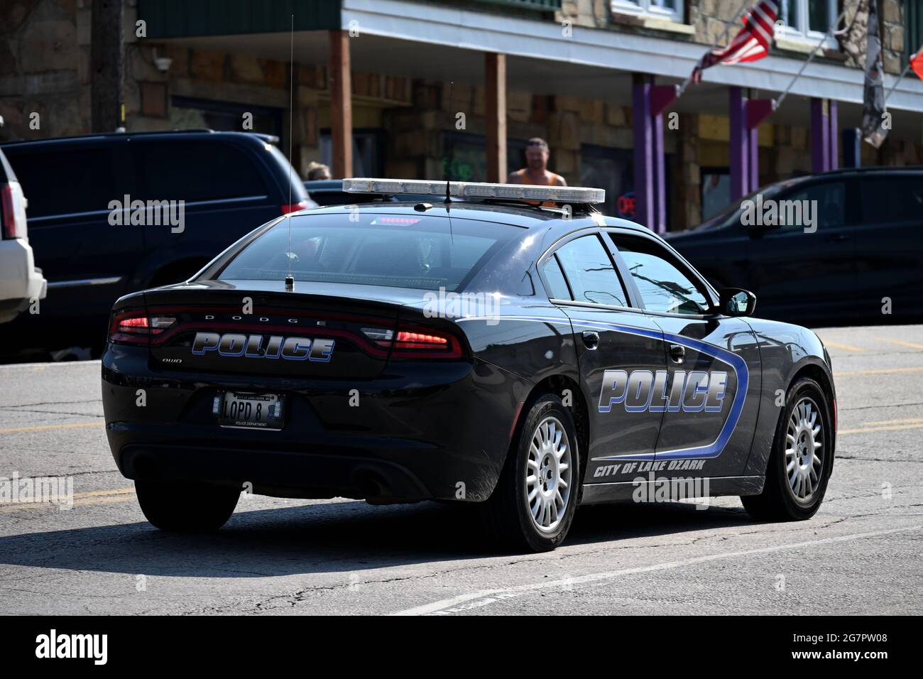Lake Ozark Police Department Dodge Charger driving through the Bagnell Dam Strip in Lake Ozark, Missouri, United States. Stock Photo
