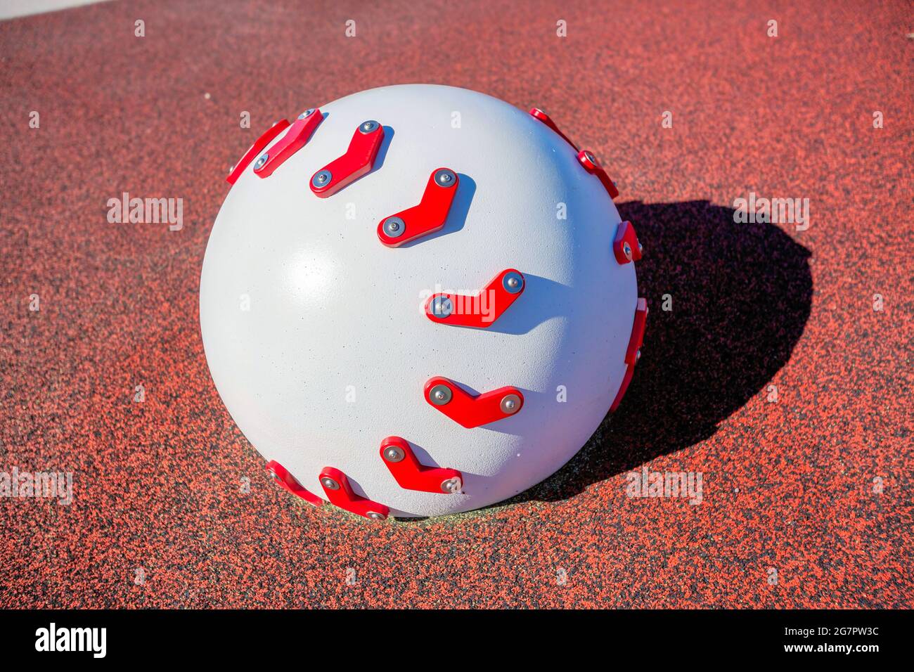 Huge white ball in a playground Stock Photo