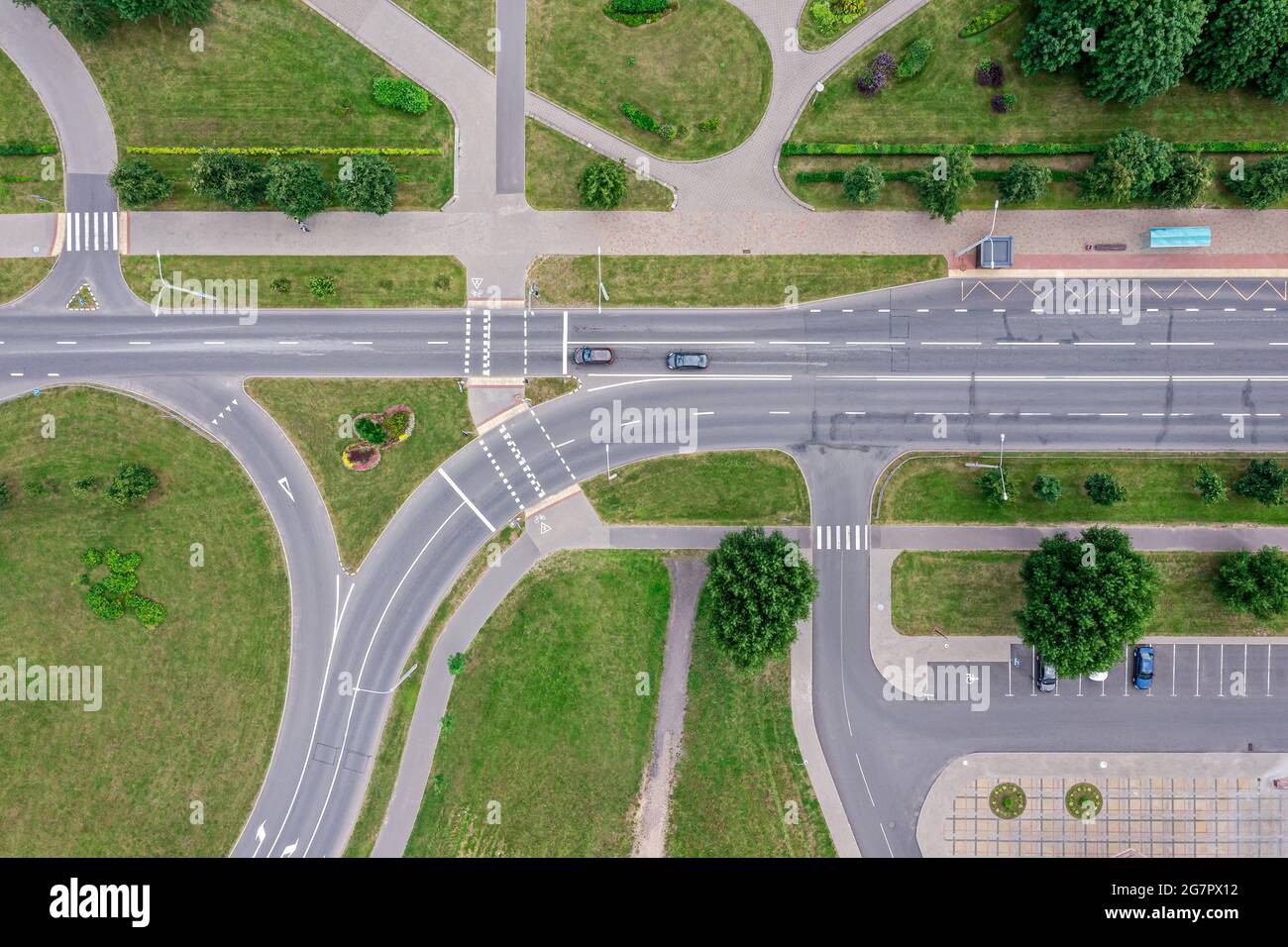 suburban neighborhood road and intersection. urban transport infrastructure. aerial top view. Stock Photo