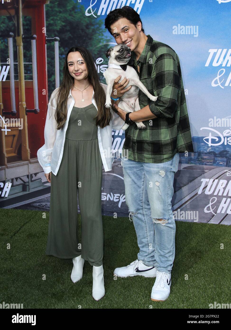 Los Angeles, United States. 15th July, 2021. CENTURY CITY, LOS ANGELES,  CALIFORNIA, USA - JULY 15: Veronica Merrell, Aaron Burriss and Guppy the  Pug arrive at the Disney 'Turner & Hooch' Los