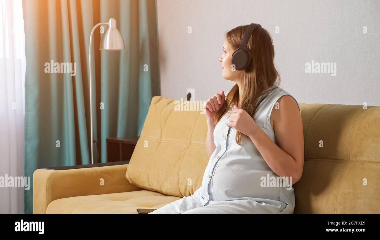 Pregnant woman listening music unborn hi-res stock photography and images -  Alamy