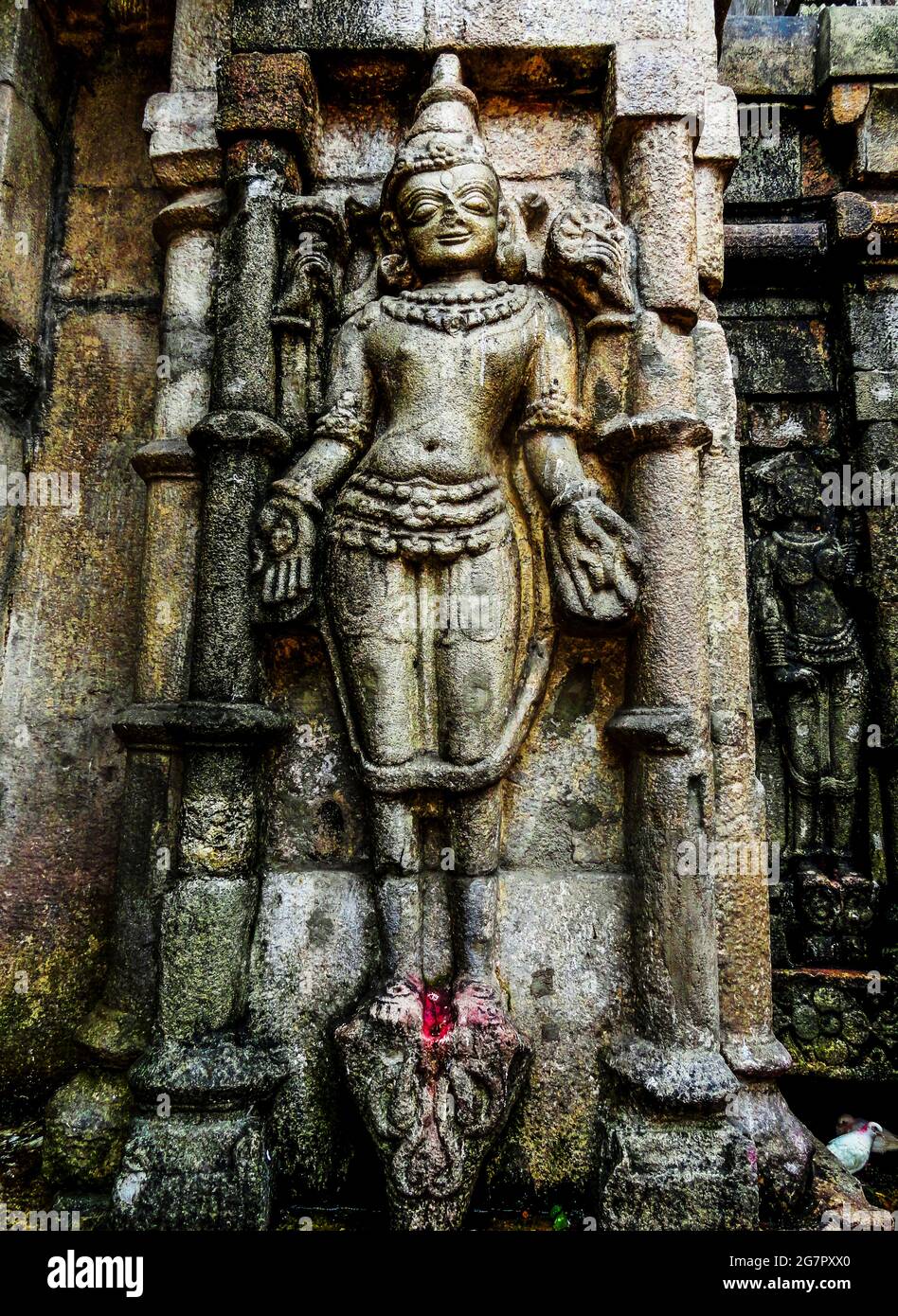 Vertical shot of an ancient Indian sculpture in Kamakhya Temple, India ...