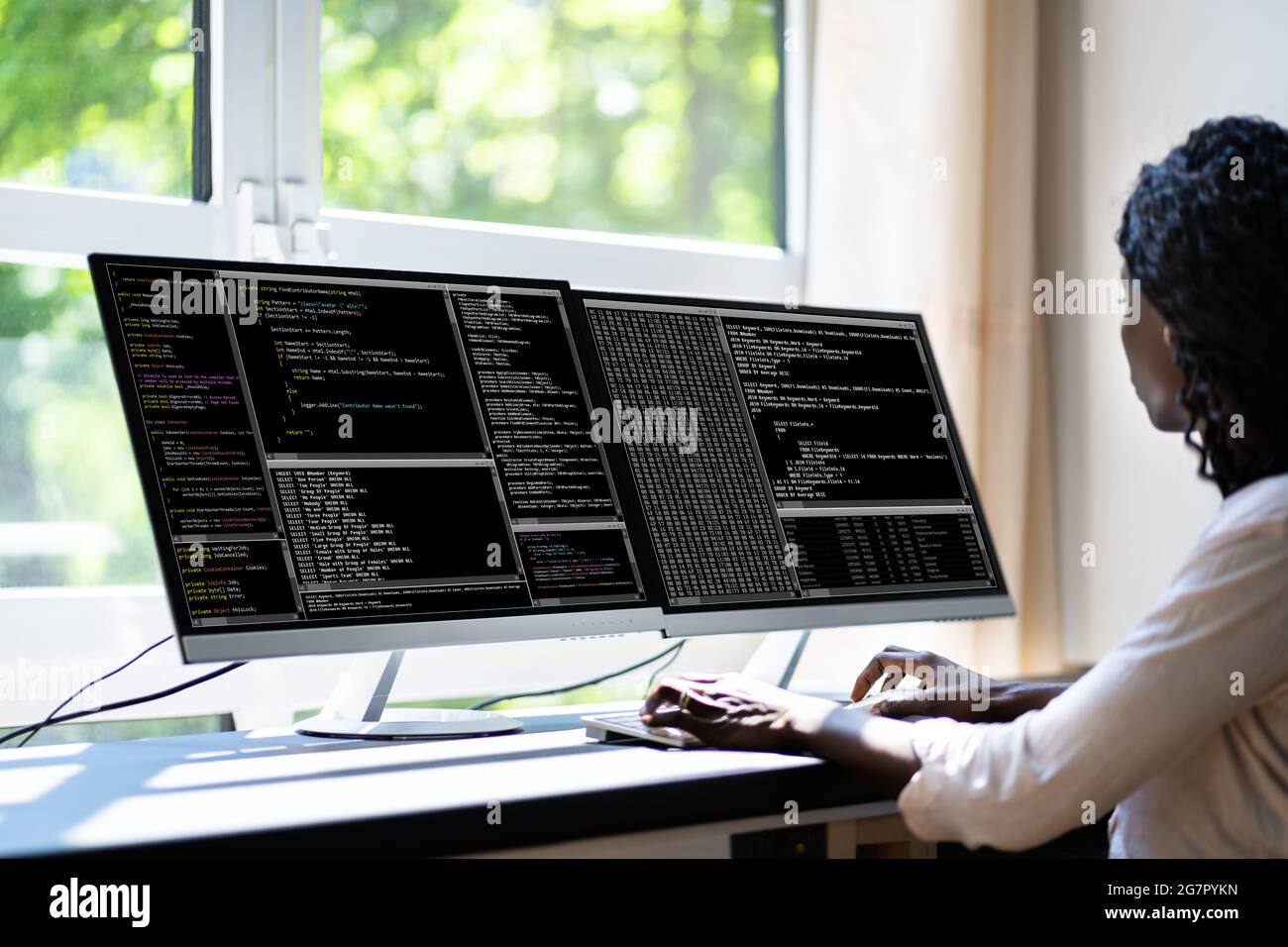 African American Woman Programmer. Girl Coding On Computer Stock Photo ...