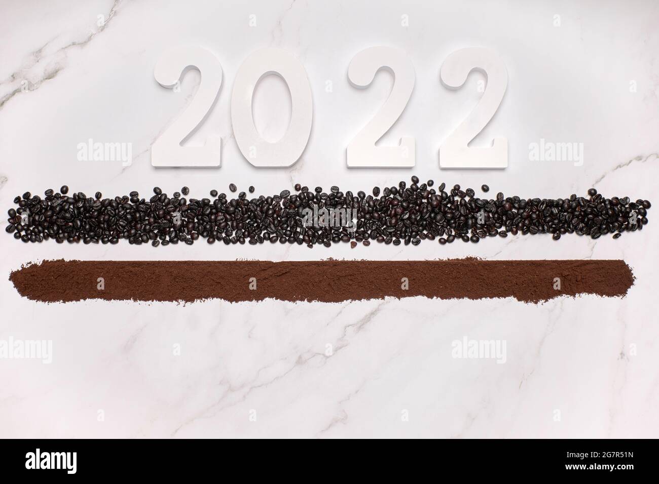 Christmas 2022 Coffee Wooden Number 2022 On A Line Of Ground Coffee And A Line Of Coffee Beans.  New Year And Christmas Celebration Concept Stock Photo - Alamy