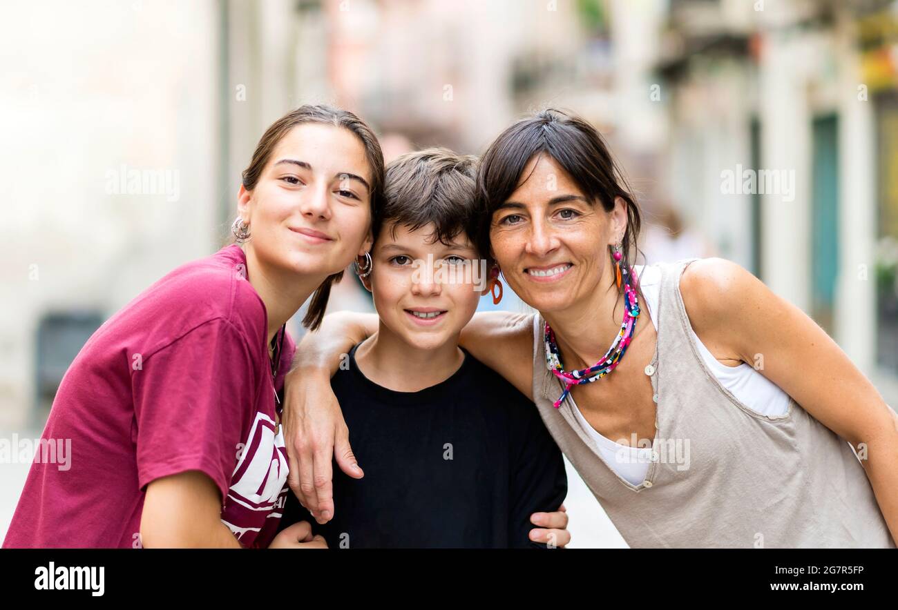 Cute mom embracing her teen daughter hi-res stock photography and images -  Alamy