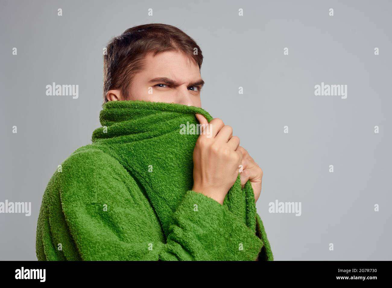bearded man in green robe isolated background lifestyle studio Stock ...
