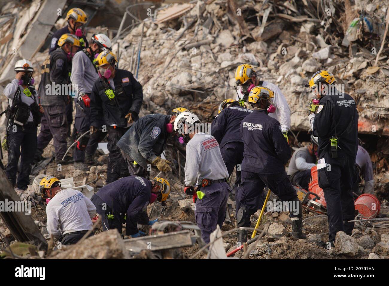 WASHINGTON, July 16, 2021 File photo released by the Miami-Dade Fire Rescue on July 8, 2021 shows task force members working at the residential building collapse site in Miami-Dade County, Florida, the United States. The search for victims in the condo collapse incident in Surfside, U.S. state Florida, neared the end, with death toll now standing at 97, local authorities said Thursday, exactly three weeks after the disaster happened. (Miami-Dade Fire Rescue/Handout via Xinhua) Stock Photo