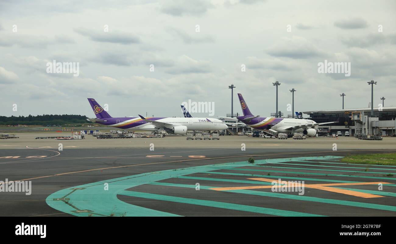 NARITA, JAPAN - May, 2018 : Narita International Airport view, Airplane parking at passenger gate. Stock Photo