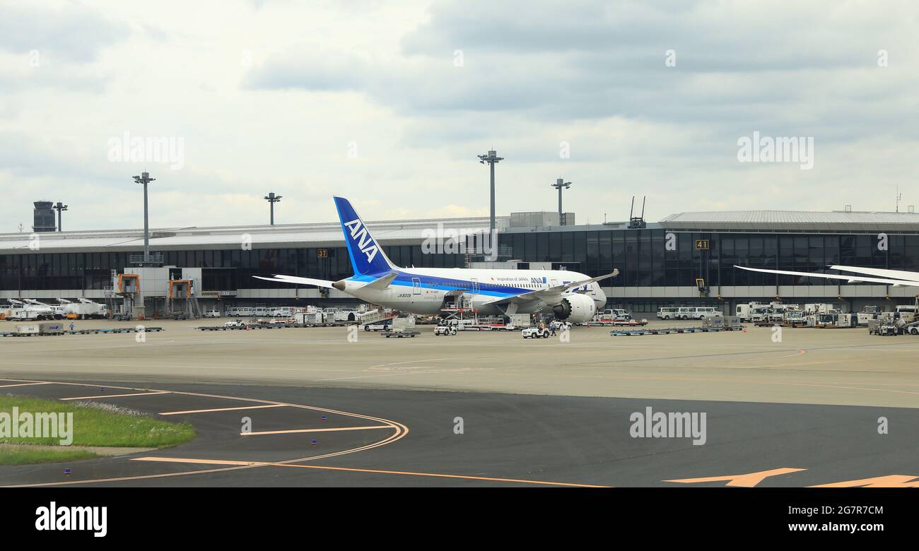 NARITA, JAPAN - May, 2018 : Narita International Airport view, Airplane parking at passenger gate. Stock Photo