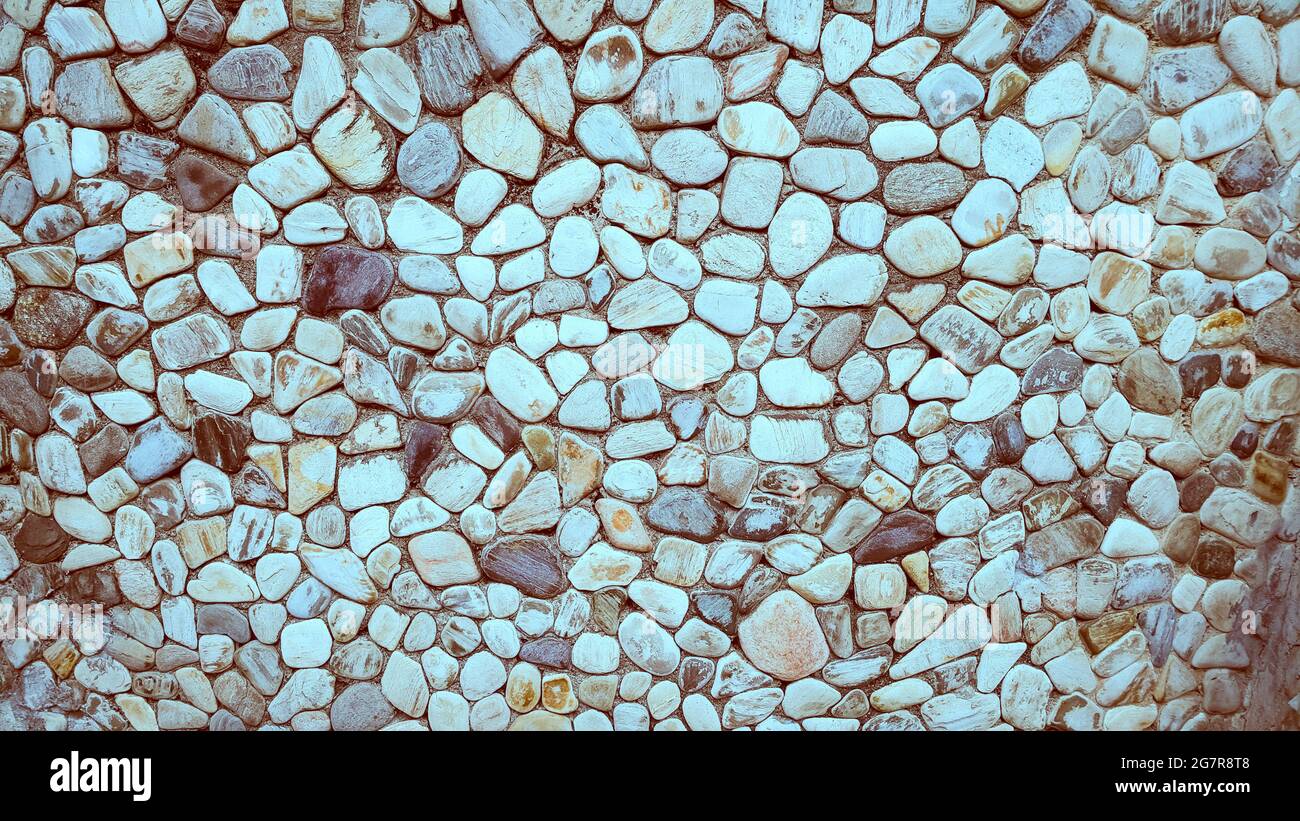 river rock wall texture background Stock Photo - Alamy