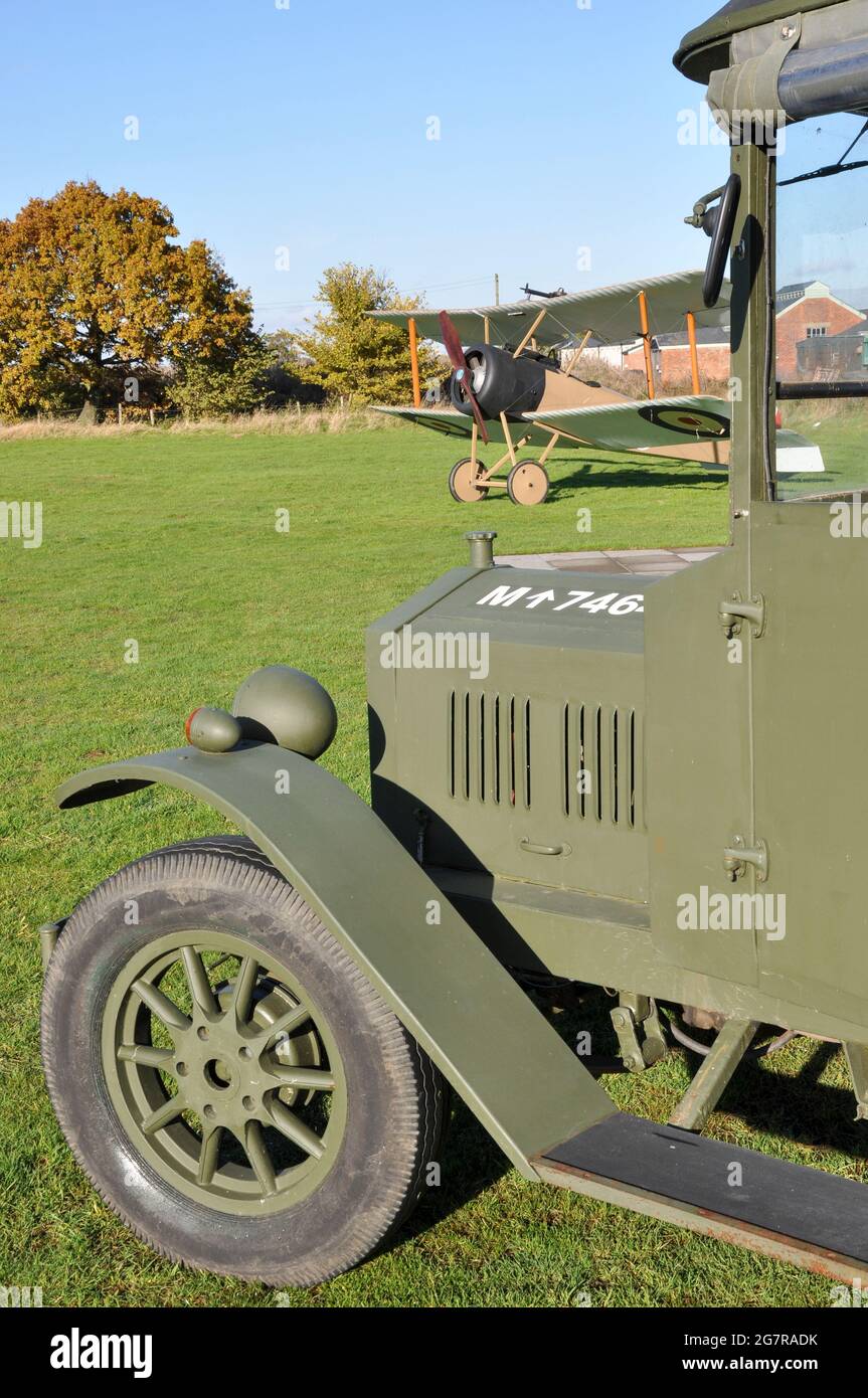 Replica of vintage Royal Flying Corps RFC Sopwith Pup biplane and lorry, vehicle at Stow Maries aerodrome, First World War, Great War airfield Stock Photo