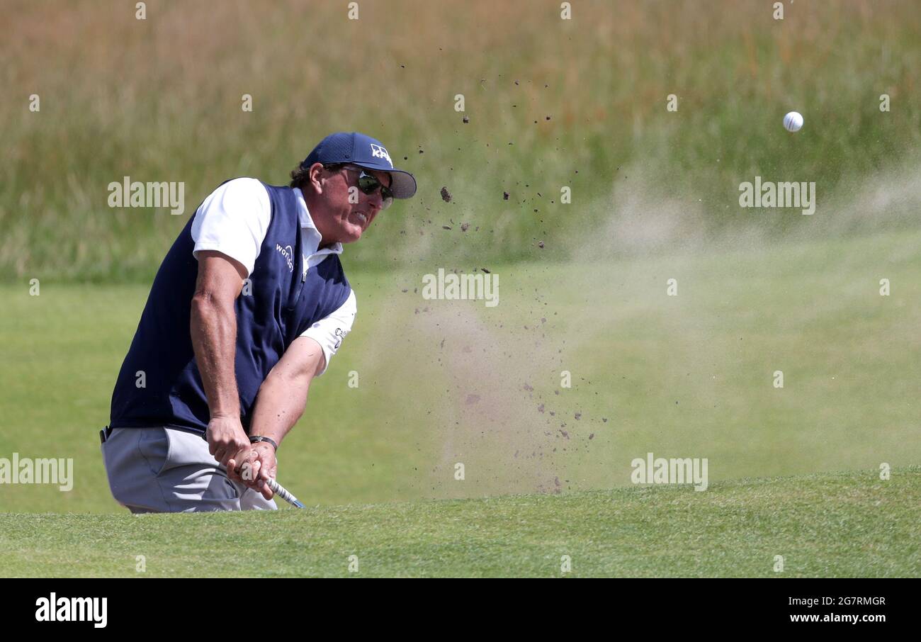 USA's Phil Mickelson chips on to the sixth green during day two of The Open at The Royal St George's Golf Club in Sandwich, Kent. Picture date: Friday July 16, 2021. Stock Photo