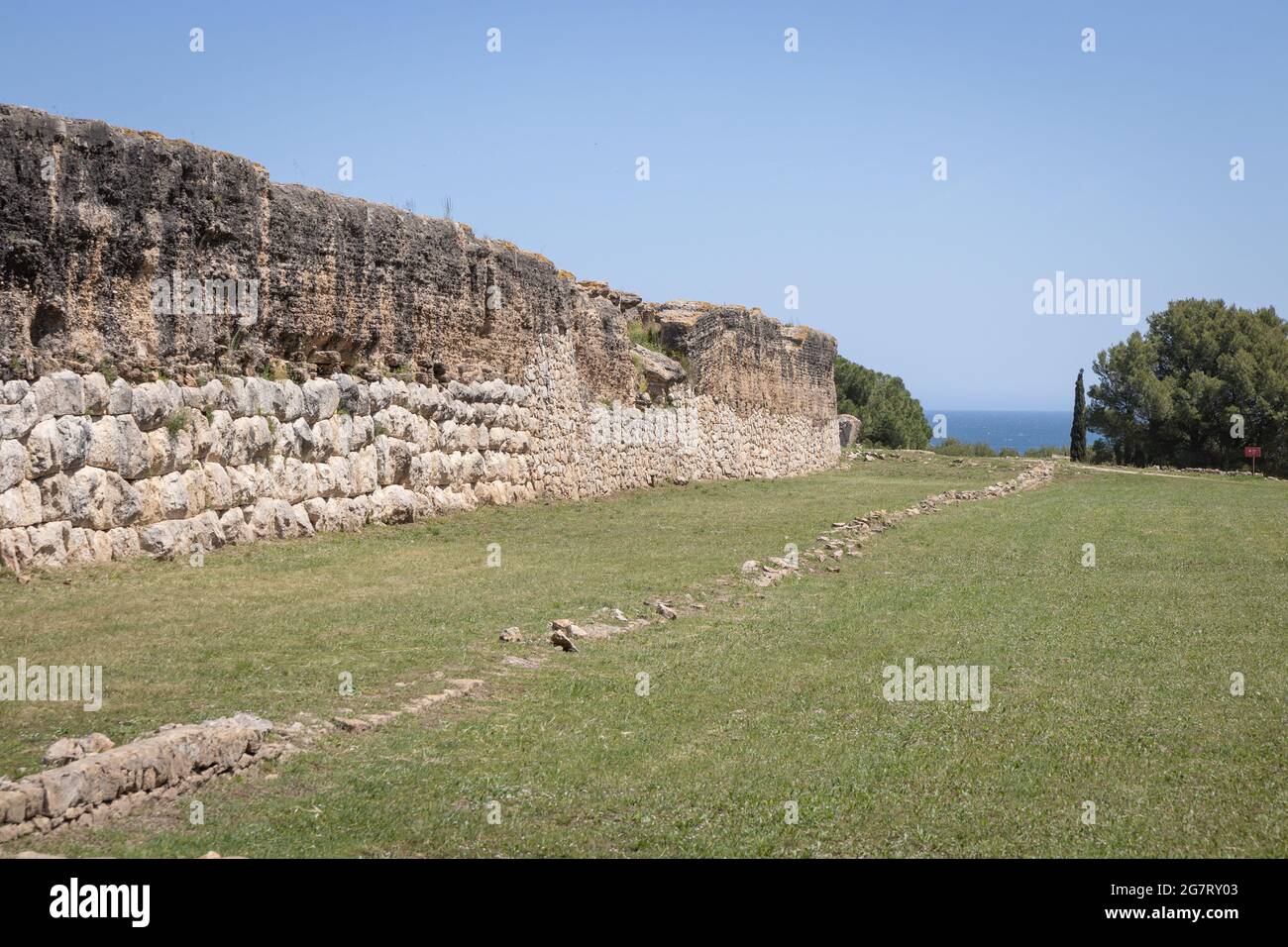 EMPURIES, SPAIN-MAY 8, 2021: Archaeological Remains of ancient city Empuries. Remains of City walls. Archaeology Museum of Catalonia, Spain. Stock Photo